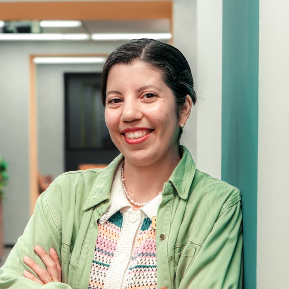 Micaela Villalobos smiling in a head-and-shoulders portrait